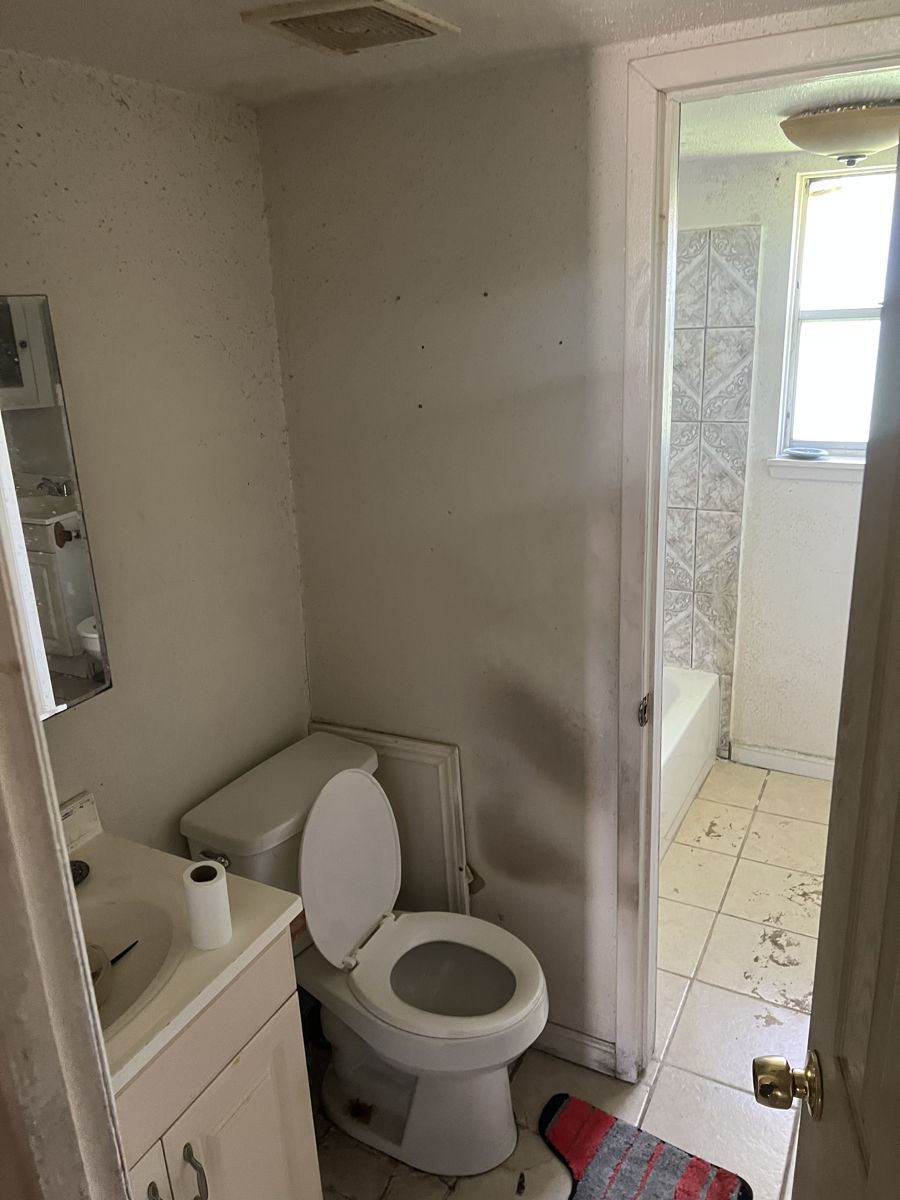 Bathroom needing work in a Houston 77091 house before sale