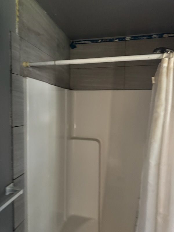 Dated shower in a Carson City 89705 house before sale