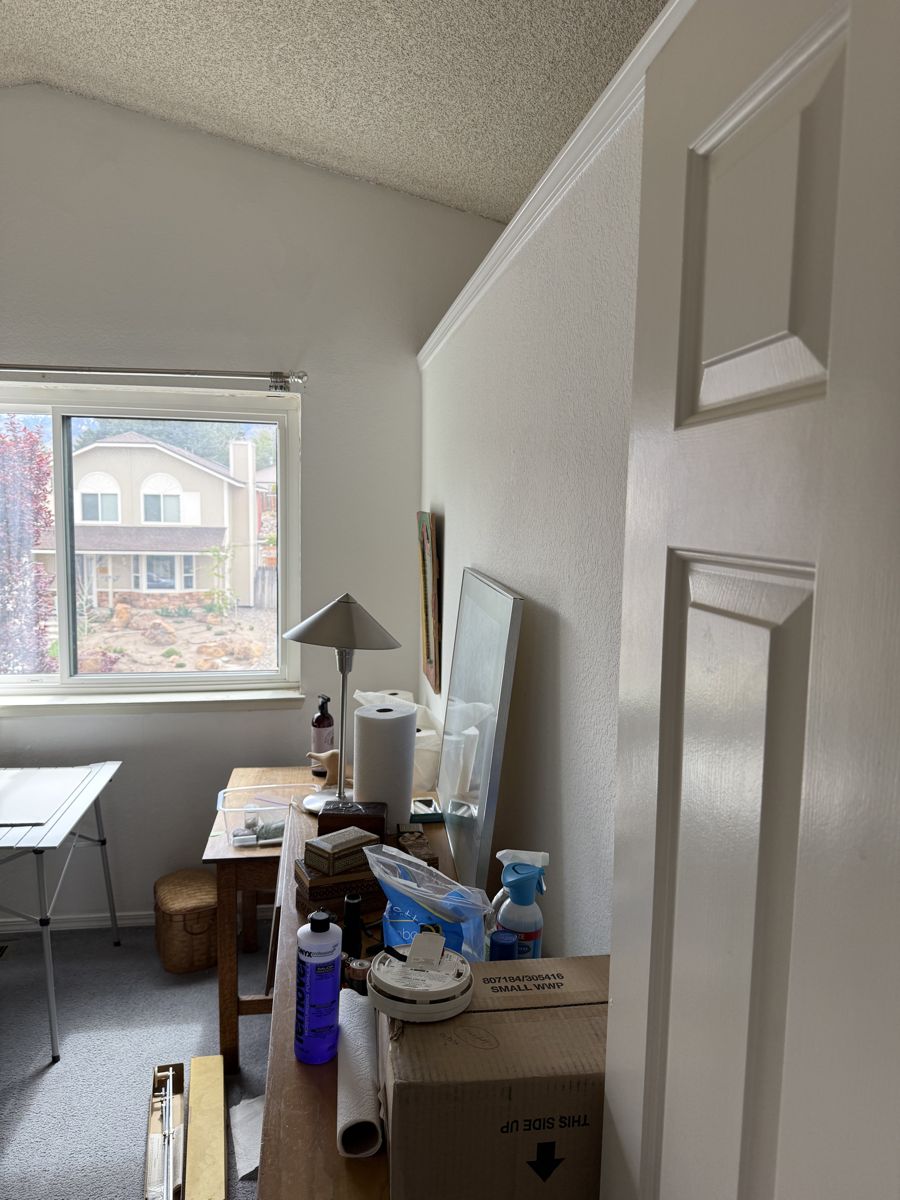 Bedroom full of belongings in a Reno 89523 house bought as-is, contents included